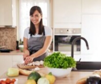 Advantages of early dinner. A woman preparing dinner.