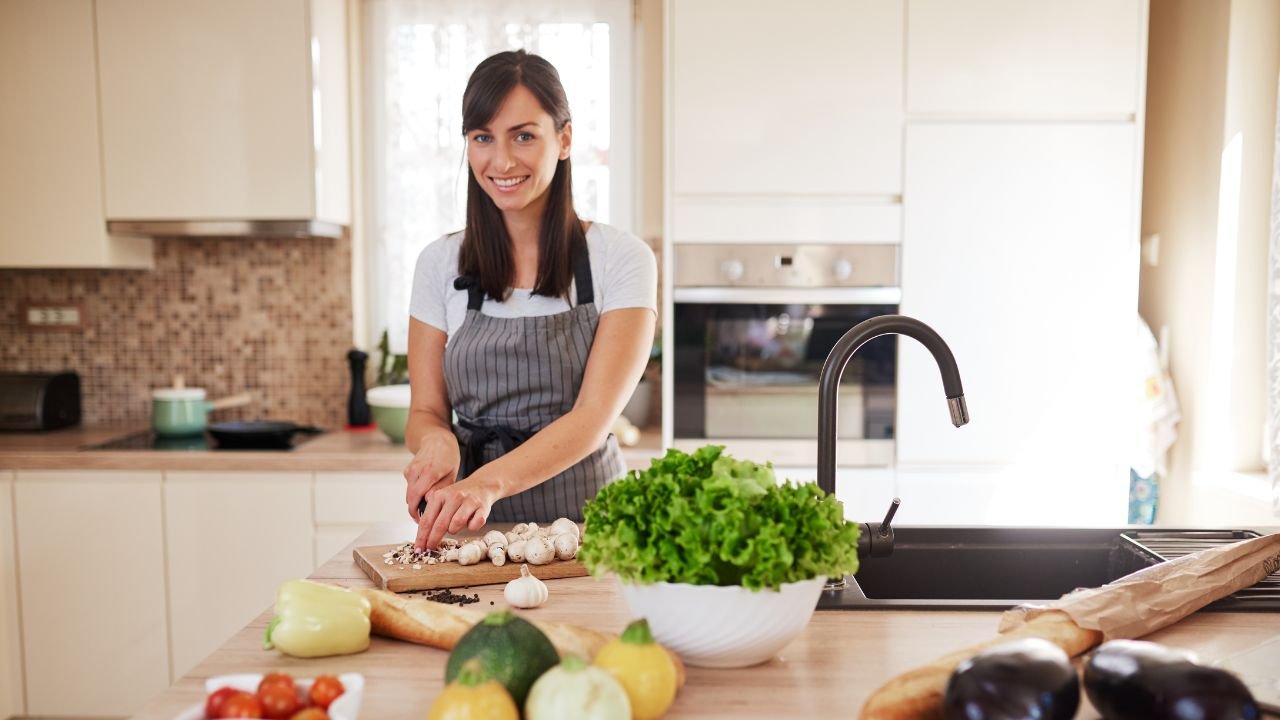Advantages of early dinner. A woman preparing dinner.